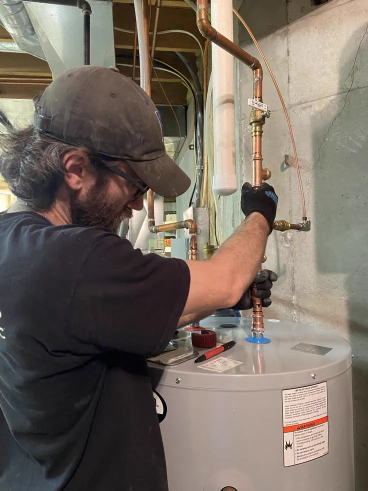 Technician servicing commercial equipment